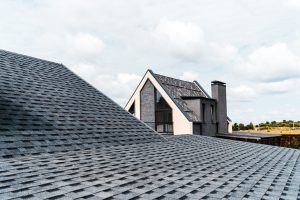 selective focus of building with windows near rooftop